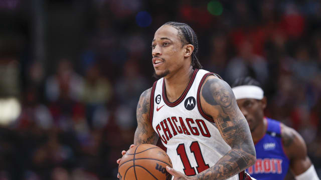 Chicago Bulls forward DeMar DeRozan (11) looks to pass the ball against the Detroit Pistons